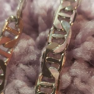 2 silver necklaces and 1 matching bracelet